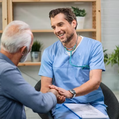 Medical Professional Talking to Elderly Man