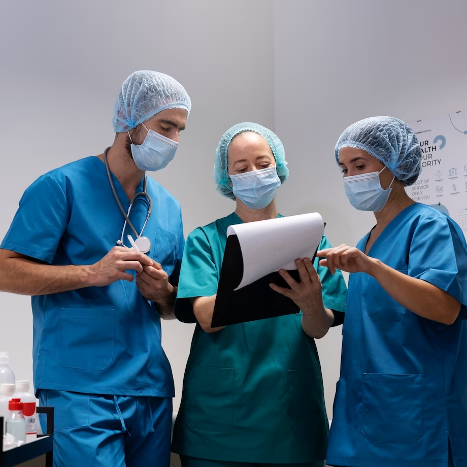 Medical Professionals reviewing clipboard